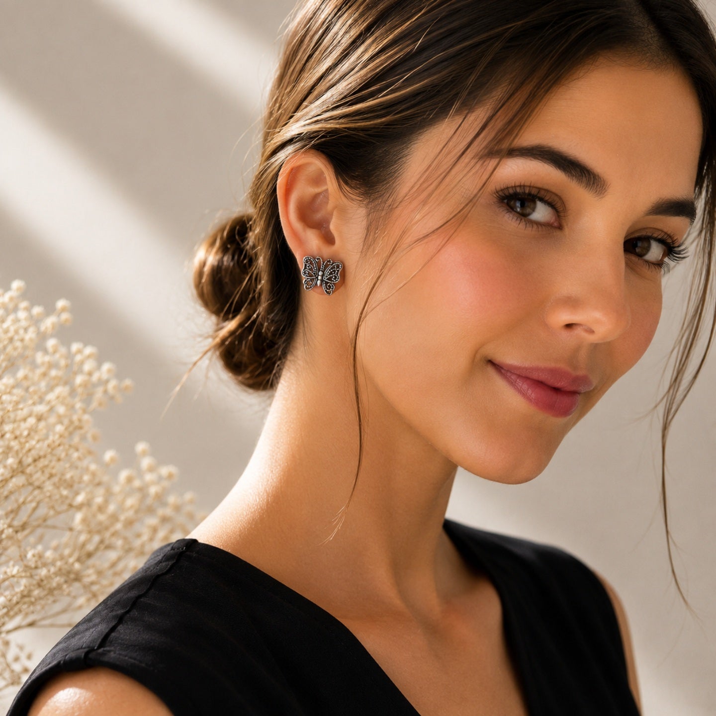 Aretes mariposa tejida